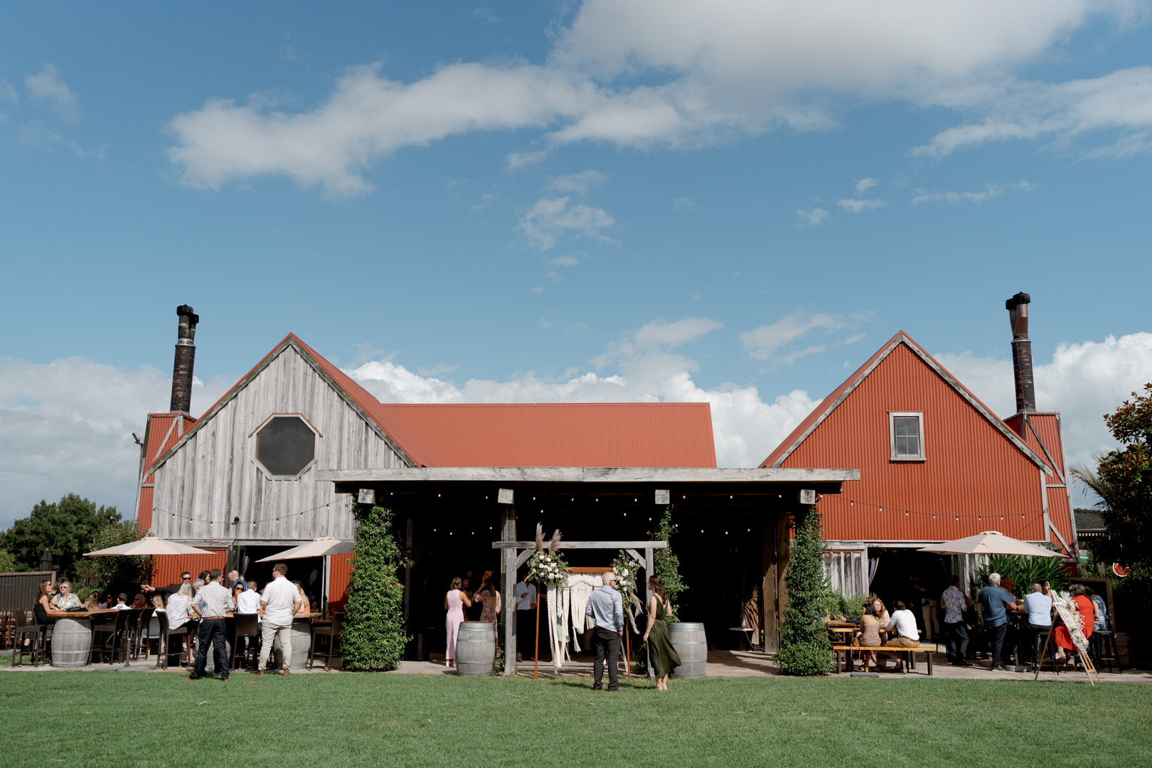 Guests enjoying the Stables Matakana wedding venue, one of Auckland's most sought-after countryside wedding venues.